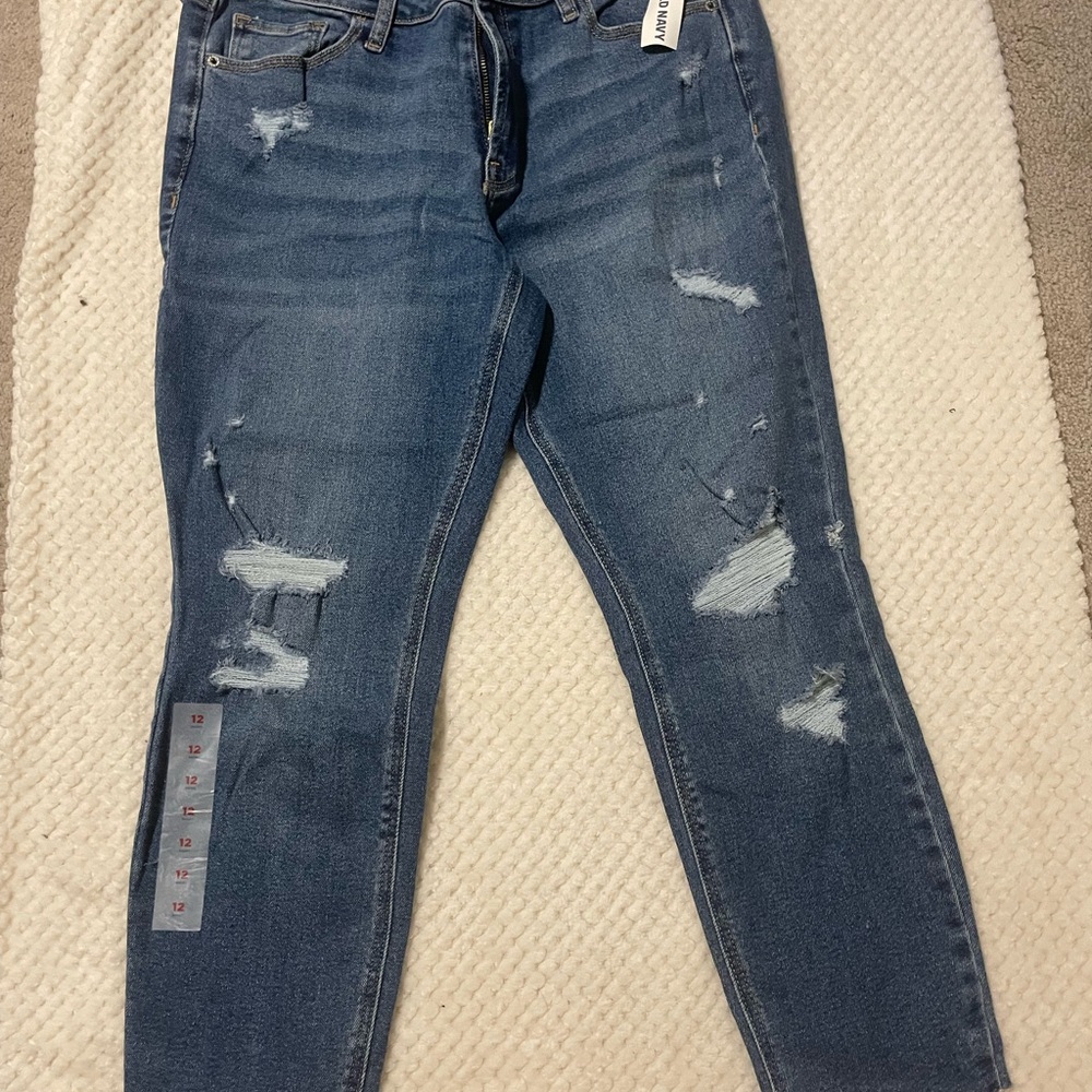 Old Navy Rockstar, super skinny mid rise ankle length, distressed denim.